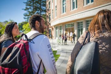 UNH students walking to Paul College