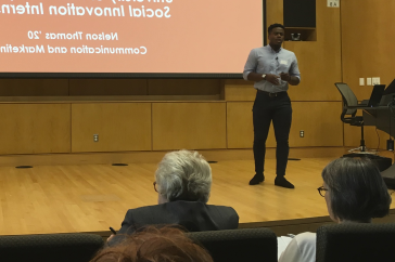 Nelson Thomas ’20 making his presentation at the Social Innovation showcase.